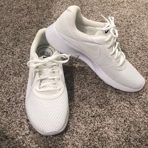 Men’s white Nike sneakers